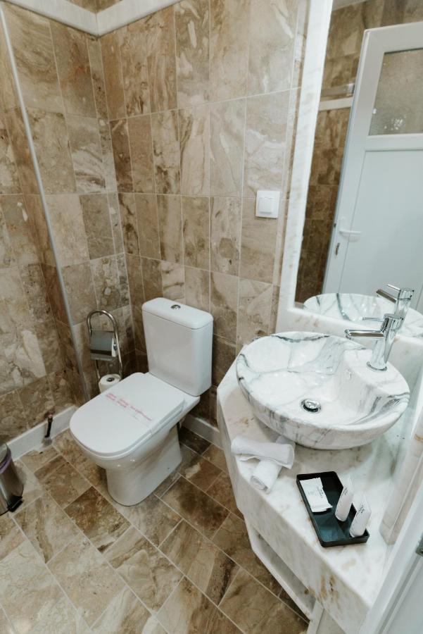 Blue And White Luxury Suites Nea Kallikrateia Экстерьер фото